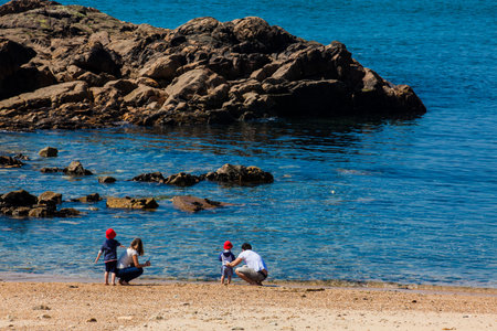 PORTO, PORTUGAL - MAY, 2018:  People enjoying a sunny early spring day at the beautiful beaches along the Porto city coastのeditorial素材