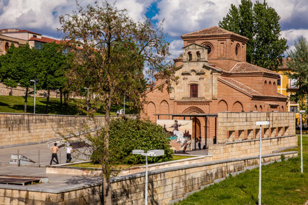 SALAMANCA, SPAIN - MAY, 2018: Skaters at the Skate Park next to the historical Santiago del Arrabal...