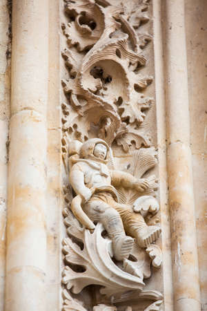 Astronaut carved on the facade of the historical Salmanca Cathedralの写真素材