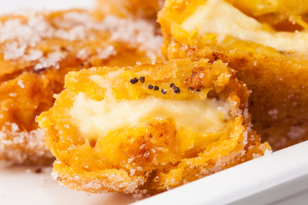 Typical Colombian aborrajados served on a white dish