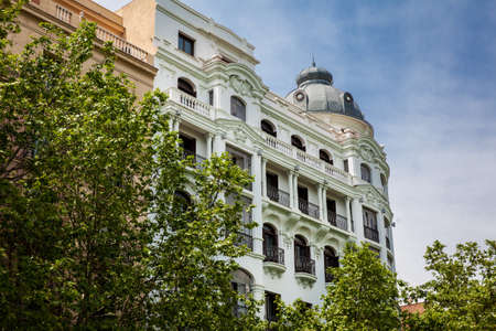 Architecture of the beautiful antique buildings at Madrid city centerの写真素材