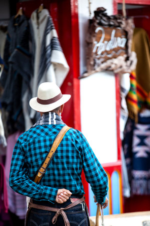 SALENTO, COLOMBIA - JULY 2021. Man dressed with the traditional outfit of the arrieros at the small town of Salento located at the region of Quindio in Colombiaのeditorial素材