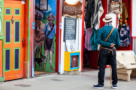 SALENTO, COLOMBIA - JULY 2021. Man dressed with the traditional outfit of the arrieros at the small town of Salento located at the region of Quindio in Colombiaのeditorial素材