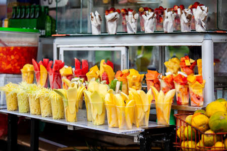 Street sell of mango and other fruits at the beautiful streets of Salento a small town located at the Quindio region in Colombiaの写真素材