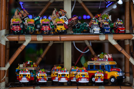 SALENTO, COLOMBIA - JULY 2021. Handmade models of traditional chivas and Jeeps Willy in a handicrafts store in Salento a small town located at the Quindio region in Colombiaのeditorial素材