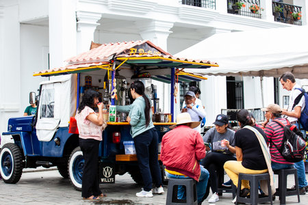 POPAYAN, COLOMBIA - MAY, 2022: Colombian coffee street sell using a modified traditional Willys jeep at the Caldas Square in the center of the city of Popayanのeditorial素材