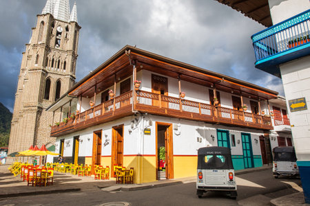 JARDIN, COLOMBIA - NOVEMBER, 2017: View of the colonial houses next to the central square and the Minor Basilica of the Immaculate Conception at the small town of Jardin in the Southwestern Antioquia in Colombiaのeditorial素材