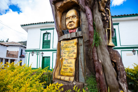 Iza, Boyaca, Colombia - August 9th 2023. Monument to the Colombian musician Francisco Cristancho Camargo carved on a tree at the beautiful small town of Izaのeditorial素材