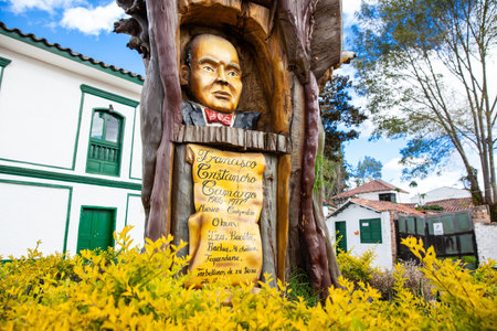 Iza, Boyaca, Colombia - August 9th 2023. Monument to the Colombian musician Francisco Cristancho Camargo carved on a tree at the beautiful small town of Izaのeditorial素材