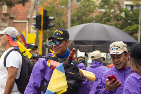 Bogota, Colombia - 18 October 2023. Peaceful protest of the members of the active reserve of the military and police forces in Bogota Colombia against the government of Gustavo Petro.のeditorial素材