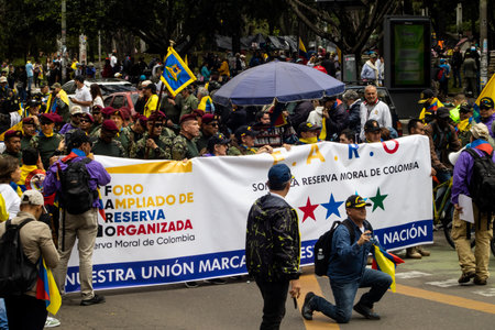 Bogota, Colombia - 18 October 2023. Peaceful protest of the members of the active reserve of the military and police forces in Bogota Colombia against the government of Gustavo Petro.のeditorial素材