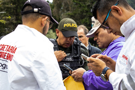 Bogota, Colombia - 18 October 2023. Peaceful protest of the members of the active reserve of the military and police forces in Bogota Colombia against the government of Gustavo Petro.のeditorial素材