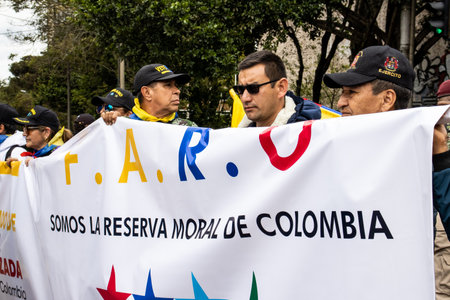 Bogota, Colombia - 18 October 2023. Peaceful protest of the members of the active reserve of the military and police forces in Bogota Colombia against the government of Gustavo Petro.のeditorial素材