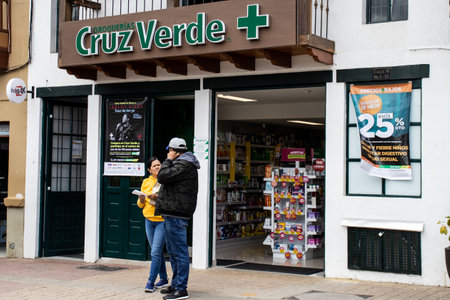 La Calera, Cundinamarca, Colombia - 31 October 2023. Facade of the Cruz Verde pharmacy. Drug store concept.のeditorial素材
