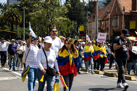 BOGOTA, COLOMBIA - MARCH 6, 2024. March asking for Gustavo Petro impeachment. Peaceful protest march in Bogota Colombia against the government law reforms.のeditorial素材