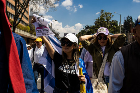 BOGOTA, COLOMBIA - MARCH 6, 2024. March asking for Gustavo Petro impeachment. Peaceful protest march in Bogota Colombia against the government law reforms.のeditorial素材