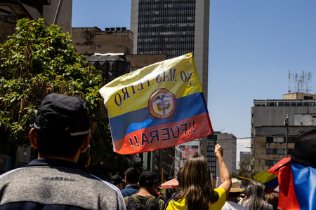 BOGOTA, COLOMBIA - MARCH 6, 2024. March asking for Gustavo Petro impeachment. Peaceful protest march in Bogota Colombia against the government law reforms.のeditorial素材