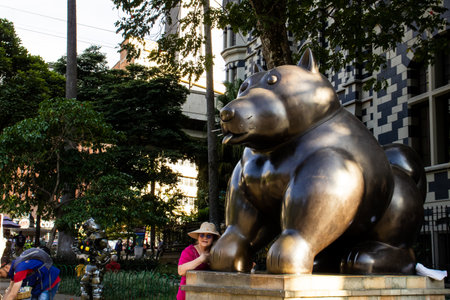 MEDELLIN, COLOMBIA - JANUARY 17, 2024: Dog. Bronze sculptures by the famous Colombian artist Fernando Botero Angulo in the square that bears his name in the center of the city of Medellin.のeditorial素材