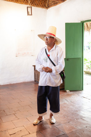 GUADUAS, COLOMBIA - JANUARY 12, 2024: Tourists guide at the natal house of the Colombian independent heroine Policarpa Salavarrieta, also known as La Pola in her hometown.のeditorial素材