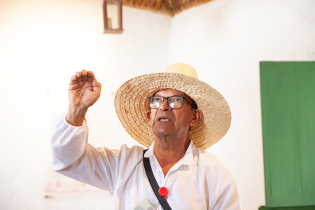 GUADUAS, COLOMBIA - JANUARY 12, 2024: Tourists guide at the natal house of the Colombian independent heroine Policarpa Salavarrieta, also known as La Pola in her hometown.のeditorial素材