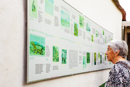 GUADUAS, COLOMBIA - JANUARY 12, 2024: Senior woman tourists at the natal house of the Colombian independence heroine Policarpa Salavarrieta, also known as La Pola in her hometown.のeditorial素材