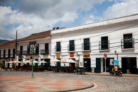 GUADUAS, COLOMBIA - JANUARY 12, 2024: View of the beautiful streets around the central square of the Heritage Town of Guaduas located in the Department of Cundinamarca in Colombia.のeditorial素材