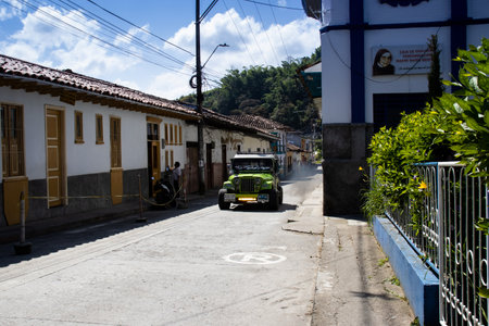 SALAMINA, COLOMBIA - JANUARY 14, 2024: Beautiful street of the heritage town of Salamina located at the Caldas department in Colombia. Traditional yipao.のeditorial素材