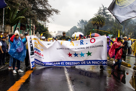 BOGOTA, COLOMBIA - April 21, 2024. March asking for Gustavo Petro impeachment. Peaceful protest march in Bogota Colombia against the law reforms of Gustavo Petro government.のeditorial素材