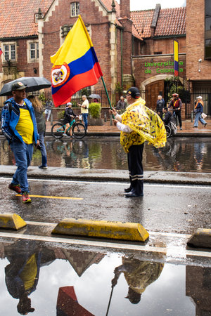 BOGOTA, COLOMBIA - April 21, 2024. March asking for Gustavo Petro impeachment. Peaceful protest march in Bogota Colombia against the law reforms of Gustavo Petro government.のeditorial素材