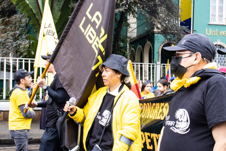 BOGOTA, COLOMBIA - April 21, 2024. March asking for Gustavo Petro impeachment. Peaceful protest march in Bogota Colombia against the law reforms of Gustavo Petro government.のeditorial素材