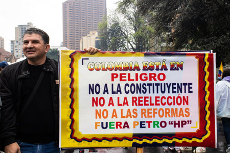 BOGOTA, COLOMBIA - April 21, 2024. March asking for Gustavo Petro impeachment. Peaceful protest march in Bogota Colombia against the law reforms of Gustavo Petro government.のeditorial素材