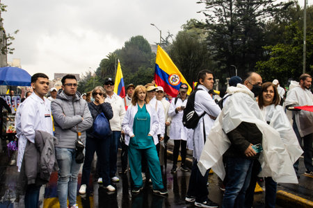 BOGOTA, COLOMBIA - April 21, 2024. March asking for Gustavo Petro impeachment. Peaceful protest march in Bogota Colombia against the law reforms of Gustavo Petro government.のeditorial素材