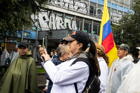 BOGOTA, COLOMBIA - April 21, 2024. March asking for Gustavo Petro impeachment. Peaceful protest march in Bogota Colombia against the law reforms of Gustavo Petro government.のeditorial素材