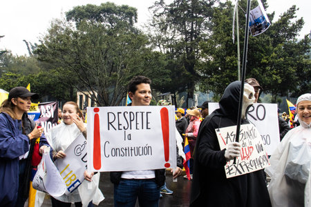 BOGOTA, COLOMBIA - April 21, 2024. March asking for Gustavo Petro impeachment. Peaceful protest march in Bogota Colombia against the law reforms of Gustavo Petro government.のeditorial素材