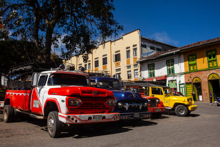 Colorful traditional vehicles at the central square of the historical heritage town of Aguadas located at the Caldas department in Colombia.のeditorial素材