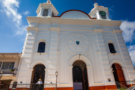 AGUADAS, COLOMBIA - JANUARY 15, 2024: Central square and the Temple of the Immaculate Conception at the historical downtown of the heritage town of Aguadas in Colombia.のeditorial素材