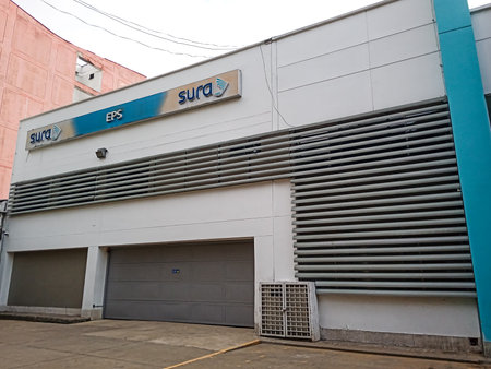 CALI, COLOMBIA - JUNE 02, 2024: Facade of a closed SURA EPS health care center. Closed EPS concept.のeditorial素材