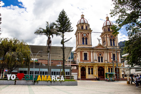 CAJAMARCA, COLOMBIA - JUNE 01, 2024: San Miguel Arcangel church at the Santander Park in the small town of Cajamarca located at the Tolima department in Colombia.のeditorial素材