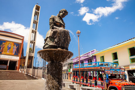 AGUADAS, COLOMBIA - JANUARY 15, 2024: Monument to the traditional Aguadas Hat Weaver at the historical center of the heritage town of Aguadas in Colombia.のeditorial素材