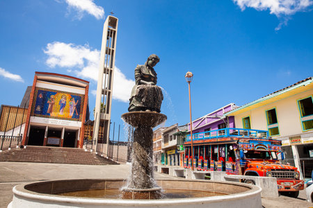 AGUADAS, COLOMBIA - JANUARY 15, 2024: Monument to the traditional Aguadas Hat Weaver at the historical center of the heritage town of Aguadas in Colombia.のeditorial素材