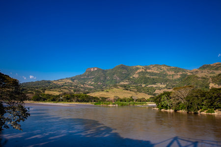 View of the Cauca River from the Cauca Bridge located at La Pintada in the Municipality of Aguadas at the department of Caldas in Colombiaの写真素材