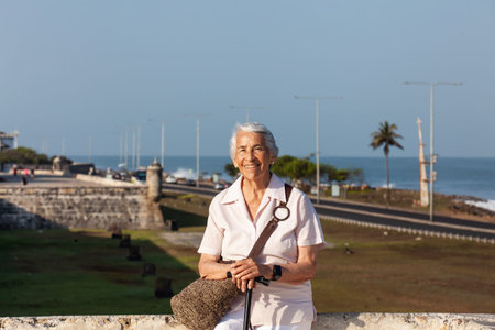 Active senior concept. Senior travel concept. Senior lifestyle. Senior woman tourist in Cartagena de Indias.の写真素材