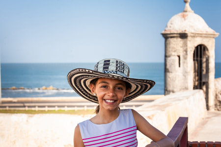 Beautiful young girl tourist wearing a hat vueltiao in Cartagena. Colombian people. Travel concept.の写真素材