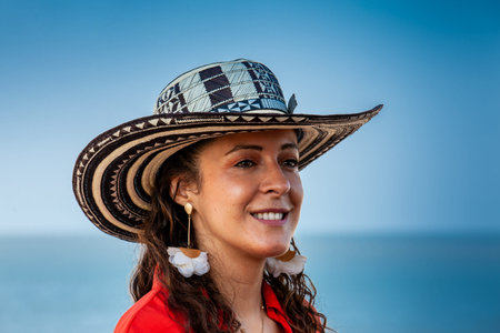 Beautiful young woman tourist wearing a hat vueltiao in Cartagena. Colombian people. Travel concept.