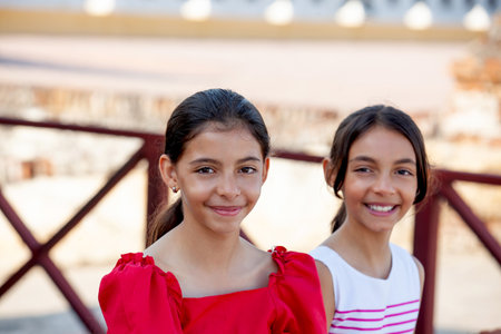 Beautiful young girls tourist in Cartagena de Indias. Colombian people. Travel concept. Real sisters.の写真素材