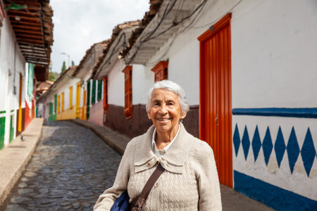 Senior woman at the beautiful colonial town of Concepcion located in the department of Antioquia in Colombia.の写真素材