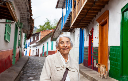 Senior woman at the beautiful colonial town of Concepcion located in the department of Antioquia in Colombia.の写真素材
