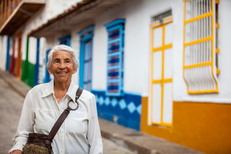 Senior woman at the beautiful colonial town of Concepcion located in the department of Antioquia in Colombia.の写真素材