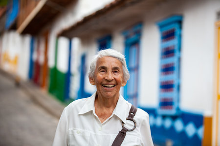Senior woman at the beautiful colonial town of Concepcion located in the department of Antioquia in Colombia.の写真素材