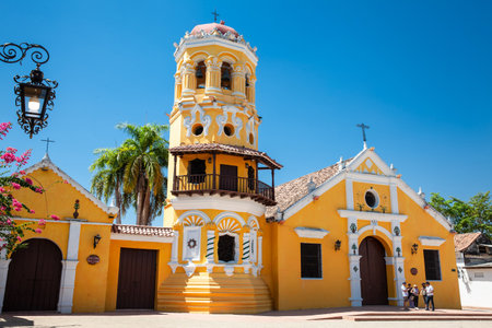 Mompox, Colombia - 23 January 2024. Group of tourists at the beautiful historic Church of Santa Barbara in the Heritage Town of Mompox.のeditorial素材